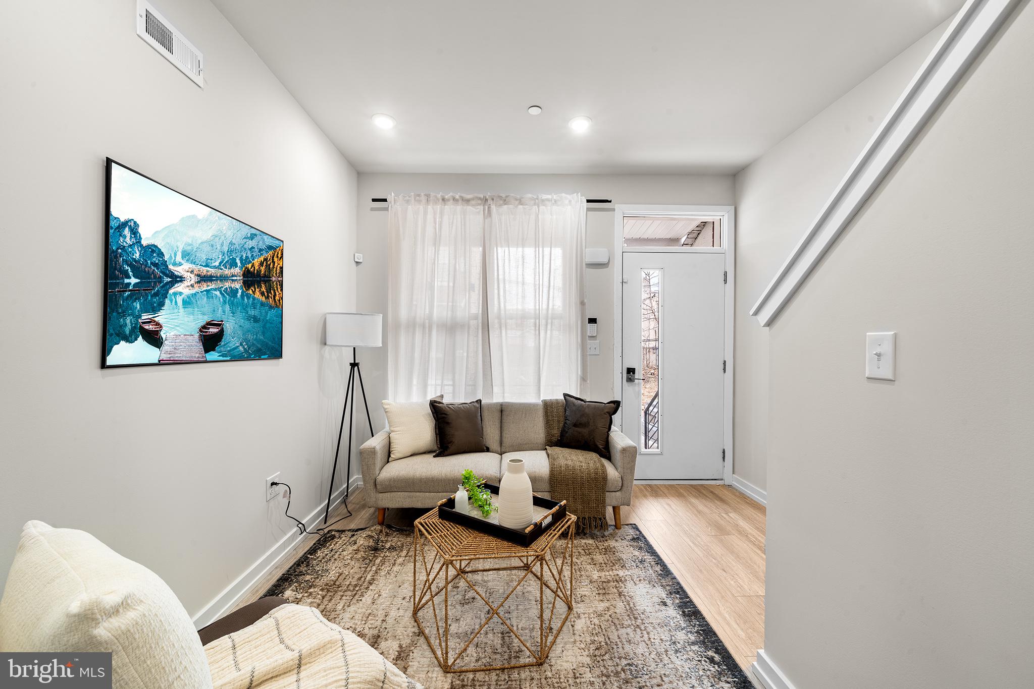 This brand-new, 2-level townhome is a perfect blend of modern design and thoughtful details, waiting for its very first owner. Located in the heart of Philadelphia’s Haddington neighborhood, the home greets you with a charming brick facade—imagine adding your personal touch with window garden boxes!
Step inside to find a sun-drenched living room featuring durable and stylish Durato Antigua LVT flooring, creating the perfect backdrop for movie night, family game time, or festive holiday gatherings. Also inside, find the gourmet kitchen that is perfect for a budding chef’s dream, boasting Frigidaire stainless steel appliances and gleaming white quartz countertops. A door leads to the backyard and patio—a tranquil retreat ideal for grilling and relaxing after a busy day in the city. There is a half bath on this level, as well.
The second floor offers two generously sized bedrooms and one full bath showcasing elegant finishes, including a Kohler toilet, vanity, and Sterling tub.
Extra details include a washer and dryer hookup on the main level, HVAC, and recessed lighting.
This property is a part of the Turn the Key Initiative, which helped people who have never owned a home or have not owned a home for three years to achieve home ownership. This also includes a 10-year tax abatement, 1-year builder warranty and access to multiple grants.
Make your dream of owning a home a reality and schedule a showing today!