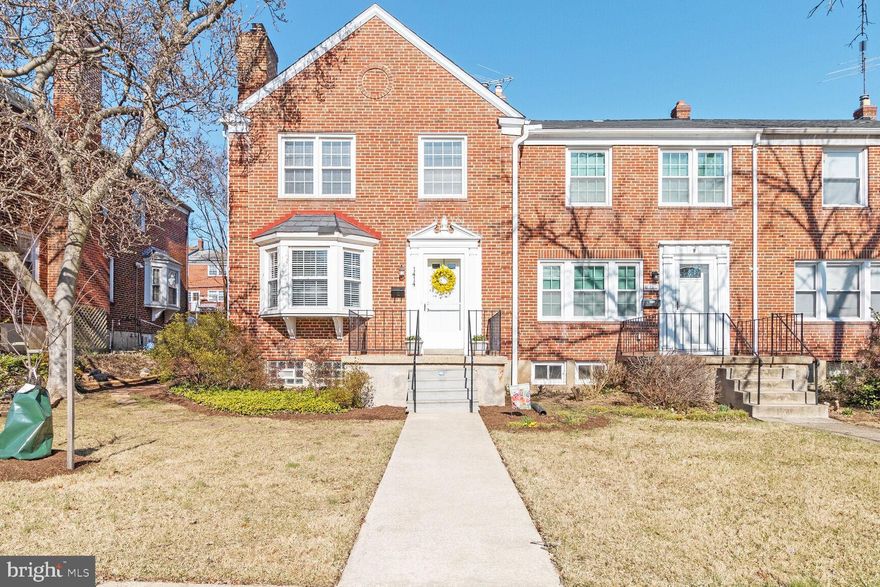 House Beautiful!    Large Brick, Three Bedroom/Two Full Bath End-Unit townhome in sought-after Edmondson Heights community.  This home boasts an array of high-end finishes and amenities.   Enjoy the beauty,  ambience and comforts of the brand new gas insert in the living room.   Home has two Bay-windows, one  in the living room and one in the dining room, to enhance the beautiful  living space and abundance of light in the home.   This end-unit has newly-refinished hardwood flooring on main and upper levels of home.  New kitchen with high-end Stainless steel appliances including gas stove, counter-depth refrigerator, Dishwasher, and built-in microwave,  beautiful new Granite counters and new flooring.   Replacement windows, doors, light fixtures, and  new custom wood blinds throughout main level of home and additional window treatments on upper level.   Finished lower-level  has Family Room with new carpet,  full bathroom, laundry/utility room for storage, and walkout to  professionally landscaped yard.  Home is located near shopping and major travel routes, and is   Move-in Ready!