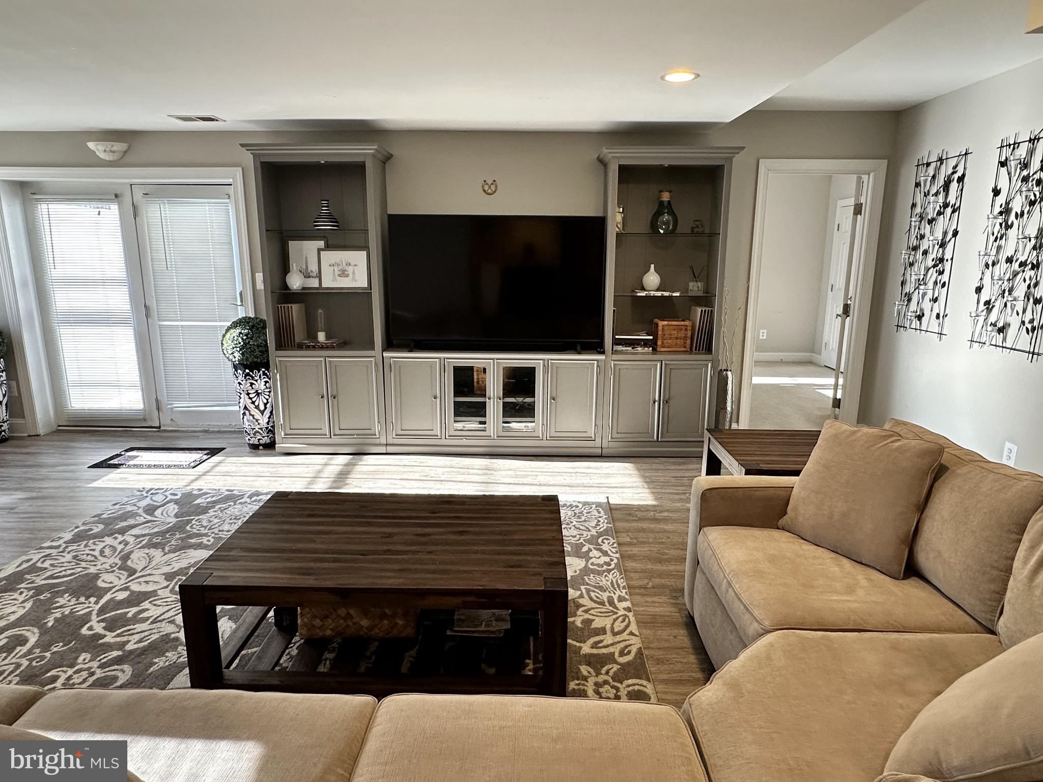 Sun filed 1500 sf fully furnished basement including utilities, 2 bedroom, den, full bath, laundry room  and half bath