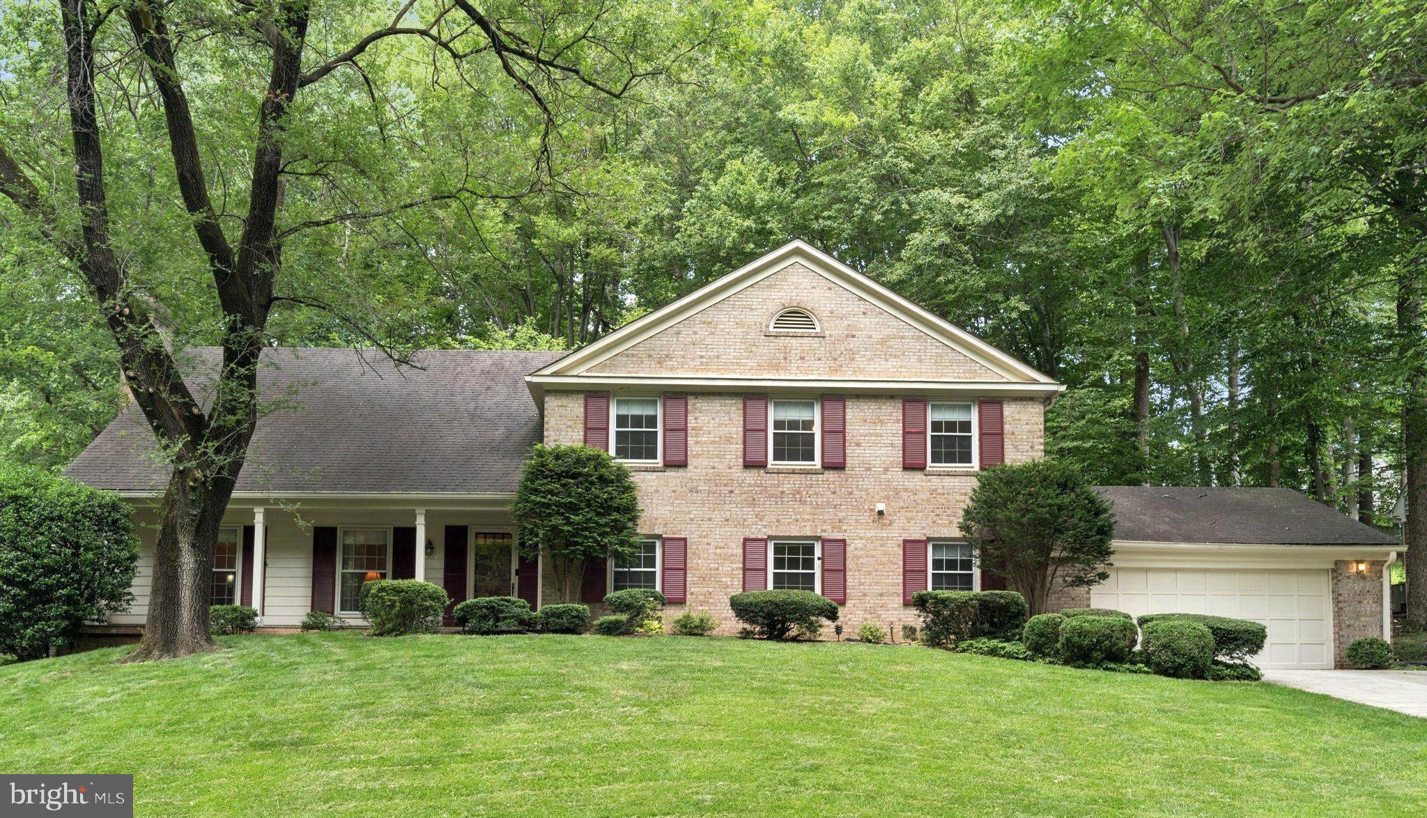 This stately Concord model sits on a gentle rise with charming front porch views of wooded green space. Located in the highly desirable River Falls community, this 4BR, 3BA Colonial is ready for its next chapter. Called “suburban splendor near the C&O Canal” and “a place where even little ones live large” (Bethesda Magazine, 7/23; Washington Post, 11/9/13), River Falls remains one of Potomac’s most sought-after neighborhoods.
The main level features a tiled entry, formal living room with floor-to-ceiling windows, white oak floors, and a wood-burning fireplace. The kitchen includes an induction cooktop, two refrigerators, and a cozy breakfast nook overlooking the private rear yard backing to dedicated green space. The kitchen and family room both open to a screened porch with skylights and grill with gas line—ideal for entertaining or family living. A versatile office/playroom/guest room, laundry, mudroom, and powder room complete the first floor.
Upstairs, the generous primary suite includes a sitting room, walk-in closets, and full bath. Two bedrooms share a Jack & Jill bath, while a fourth bedroom and hall bath provide flexibility—with potential to convert to a 5-bedroom layout.
The unfinished lower-level offers 8.5'+ ceilings and is ready for transformation into a rec room, gym, or additional living space.
Ideally situated near the River Falls swim and tennis club, playing fields, tot lot, and community center. Enjoy quick access to Bethesda, Tysons Corner, and all that Washington, DC has to offer, plus a short drive to Potomac Village with charming shops and dining. Whitman school district. A NEW ROOF WILL BE INSTALLED PRIOR TO SETTLEMENT. Welcome home to the River Falls lifestyle!