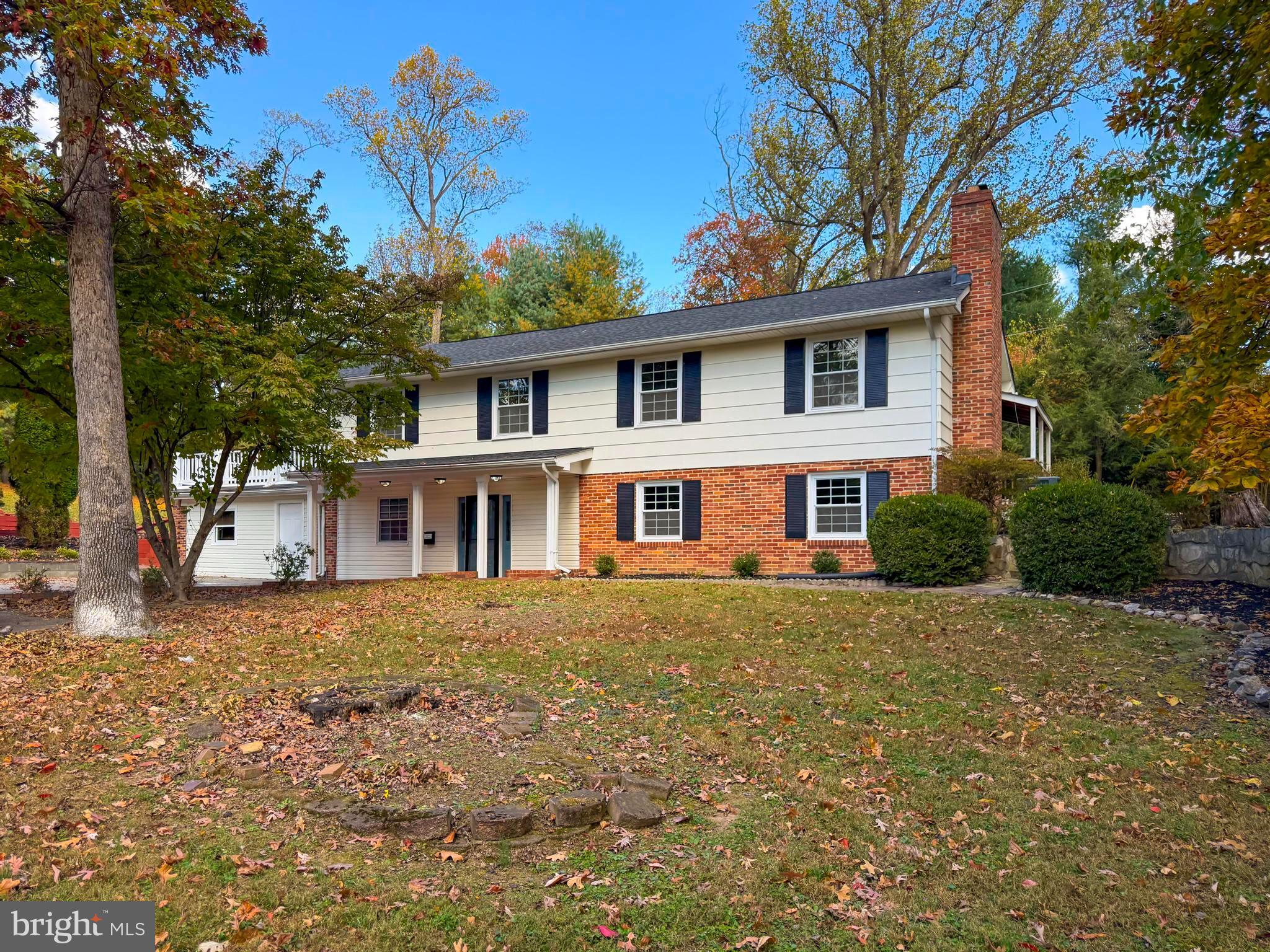 Welcome to 6661 Mohawk Court, a beautifully updated home tucked away at the end of a quiet private cul-de-sac in the heart of Columbia. Sitting proudly on a spacious 0.85-acre lot, this property offers exceptional versatility, privacy, and plenty of parking with an expanded driveway that accommodates up to 8 vehicles. The upper level features a bright living room, large updated kitchen with stainless steel appliances, an adjacent dining area, and sliding-door access to a large backyard deck—perfect for entertaining or relaxing outdoors. There are three bedrooms and two full bathrooms (renovated in 2025) freshly painted with solid hardwood floors and thoughtful updates through out. The lower level offers incredible flexibility, complete with a spacious recreation room anchored by a cozy fireplace, wet bar, and two additional rooms—ideal for guest space, home gym, or office. (One room lacks a window and is not considered a legal bedroom.) A separate side entrance adds privacy. The converted carport adds even more function—now serving as a detached accessory suite, workshop, or studio space, complete with its own entrance, HVAC system, bedroom, and wet-bar area—perfect for guests, an office, or creative workspace. This unique layout offers potential for multi-generational living or rental income potential for the savvy buyer. Recent improvements include brand-new bathrooms (2025), new sump pump (2025), fresh interior paint throughout (2025), new laminate floors in rooms (2024). Enjoy the rare combination of a peaceful wooded setting with quick access to commuter routes, local parks, shopping, and school with this wonderful property.