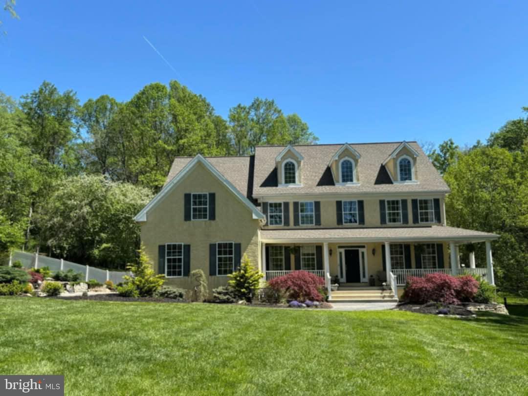 Nestled in the scenic beauty of Chester County, this elegant custom-built residence offers the perfect blend of timeless architecture and modern luxury. Situated on a private two-acre lot in prestigious Kennett Township, this exquisite 5 bedroom, 3.5 bath home boasts over 5,700 square feet of beautifully finished living space — including a 1,000 sq ft walk-out lower level.
Built in 2000, the home welcomes you with a grand foyer, sun-drenched interiors, soaring ceilings, gleaming hardwood floors, and refined custom moldings throughout. A cozy fireplace anchors the main living space, creating an inviting atmosphere ideal for entertaining or quiet evenings at home.
At the heart of the home is the gourmet kitchen — a chef’s dream — featuring a gas stove, quartz island, stainless steel appliances, abundant cabinetry, and an open-concept layout that seamlessly connects to the breakfast area and spacious family room. A formal dining room and a dedicated home office or study add functionality and sophistication to the main level.
Upstairs, four generously sized bedrooms are filled with natural light, including the luxurious primary suite — your personal sanctuary — complete with tray ceiling, dual walk-in closets, and a spa-inspired ensuite bath with double vanities, a soaking tub, and a frameless glass shower.
The fully finished walk-out basement expands your living options and includes an additional bedroom, perfect for guests, an in-law suite, media room, gym, or creative studio — all filled with natural light and direct access to the backyard.
Step outside to enjoy the professionally designed wraparound front porch, lush landscaping, mature trees, and wide-open green space ideal for entertaining, relaxing, or gardening. A spacious driveway, three-car side-entry garage, private well, and on-site septic offer both convenience and self-sufficiency.
Located in the award-winning Kennett Consolidated School District, with easy access to Route 1, Route 41, and Route 82, this home is just minutes from downtown Kennett Square, West Chester, Wilmington, and Philadelphia. Enjoy proximity to local vineyards, golf courses, parks, shopping, and dining. Lincoln University and the University of Delaware are also just a short drive away.
Whether you're seeking luxury, space, or privacy — 1 Caldwell Lane offers it all in a serene and beautifully maintained setting. Security / Alarm System with Cameras.