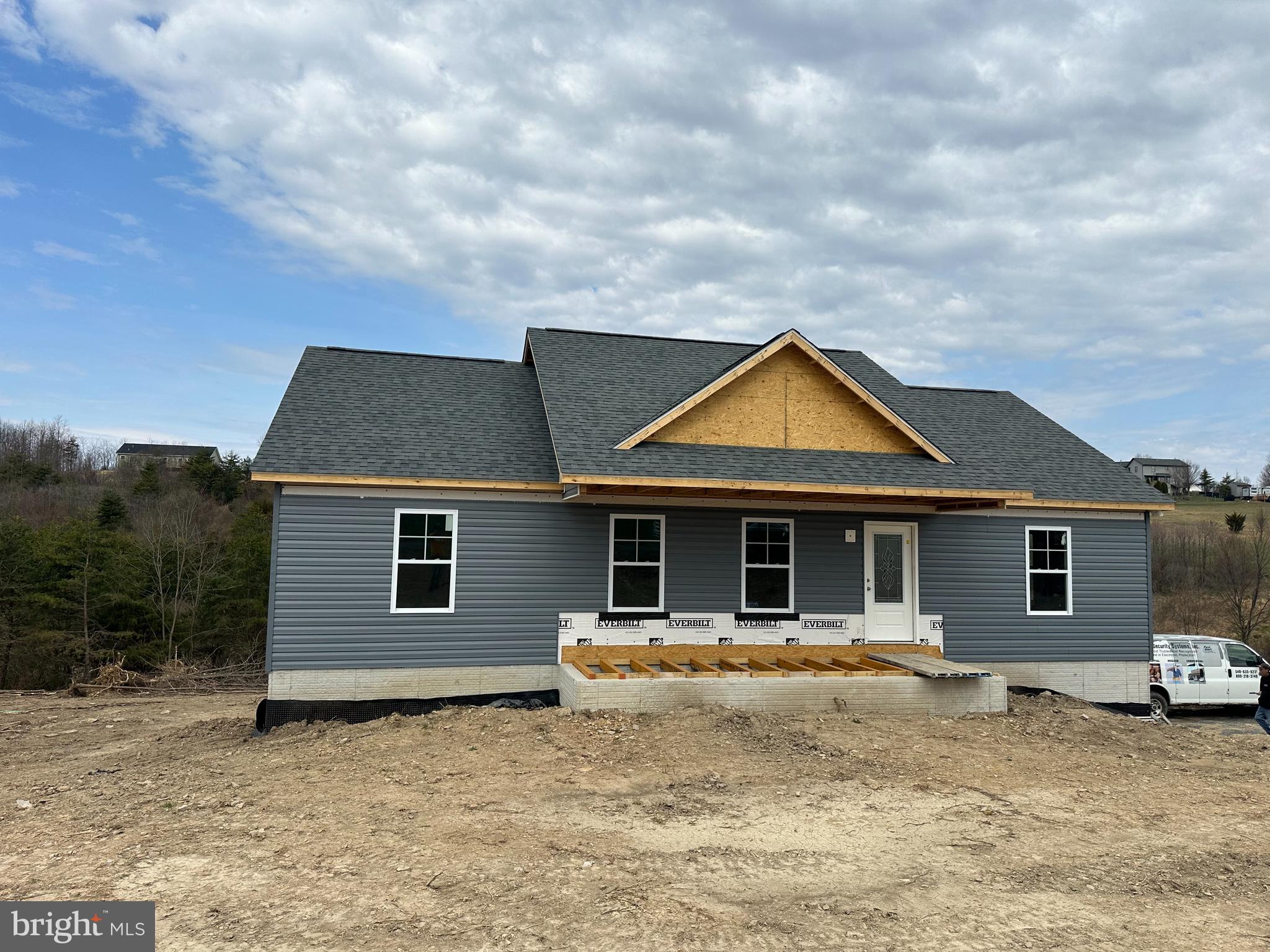 Stunning New Construction Rancher on 2 Acres with Pond Frontage!
This must-see 3-bedroom, 2-bath rancher offers 1,800 square feet of beautifully designed living space with an attached garage. Plus, it features a walkout basement already framed for a 4th bedroom and full bath, bringing the potential living space to over 2,500 square feet!
Home will be completed in the next 45-60 days! Inside, you'll love the spacious kitchen featuring a large island, breakfast bar, and elegant white cabinets—perfect for entertaining or everyday living. Main-level laundry adds convenience, while the large, finished family room in the basement provides extra space for relaxation, entertainment, or a home theater. Plus, there are additional laundry hookups in the basement for even more flexibility. Basement would make a great in-law suite.
Situated on a picturesque 2-acre lot, this home offers the perfect balance of open space and wooded privacy. The shared pond, with substantial frontage on this property, provides a tranquil spot for fishing or simply enjoying nature.
Located just outside Capon Bridge, WV, this home offers the serenity of country living while being just a short drive to Winchester, VA, for shopping, dining, and other conveniences.
Step outside to your spacious rear deck, perfect for hosting barbecues or relaxing as you take in the natural beauty. Love wildlife? Enjoy watching deer roam freely and stop for a drink at the pond.
Need extra storage or a workshop? A charming brick outbuilding, original to the property, is in great condition and would make an excellent woodshop or storage space.
Available for viewing NOW! Call your agent or schedule a private tour before it’s gone!
Don’t miss out—this gem won’t last long!