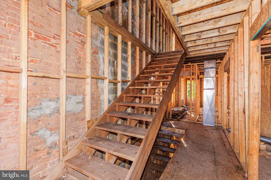 Large shell in historic neighborhood of Madison Park is ready to be completed.  This property is framed with HVAC rough-in completed.  Current framing features four finished levels with a total of 4 en-suites and 2 powder rooms. Property is sold AS-IS. Buyer to verify ground rent. Seller is looking for all reasonable offers and a quick settlement.