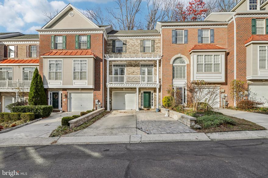 Experience refined living in this impeccably updated four-level townhome in the coveted Waters Edge at Woods Landing community, perfectly positioned to capture tranquil, wooded views. Every detail has been elevated, beginning with rich Brazilian red hardwood floors that flow seamlessly throughout the home and new custom plantation shutters that add timeless elegance and privacy.

A bright and sophisticated living room welcomes you with dual atrium doors and a dramatic three-sided gas fireplace that creates a warm, upscale ambiance. The gourmet kitchen is a true showpiece, featuring custom glazed wood cabinetry, polished granite countertops, an expansive center island, and dedicated wine and coffee bars—ideal for effortless entertaining. Step onto the private deck to enjoy serene outdoor dining surrounded by nature.

Looking out to the trees, the luxurious owner’s suite offers a spacious retreat with a spa-inspired en-suite showcasing an oversized glass shower and dual-sink vanity. Across the hall, two well-sized bedrooms accompany a newly remodeled full bath.A fourth-level loft is a spacious versatile space.

The entry level extends the home’s living space with a generous recreation room that opens to a lower deck and fenced yard with gate leading to the community’s well-maintained walking trails. There is also a convenient powder room and laundry area on this floor.  

Residents of Waters Edge enjoy exceptional amenities, including a scenic waterfront trail, fishing and crabbing pier, and kayak/canoe launch. All of this is just minutes from the Bay Bridge, Sandy Point, Route 50, and Route 97, offering the ultimate blend of luxury, convenience, and scenic views.