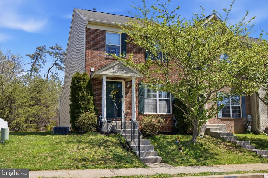 Beautifully renovated brick-front townhouse featuring 3 bedrooms, 2.5 baths, and stylish updates throughout. The bright open floor plan offers seamless flow for everyday living and entertaining, complemented by updated flooring, abundant natural light, and a beautifully renovated kitchen with white cabinetry, center island, and modern finishes. Spacious living and dining areas open to a rear deck overlooking a sizable backyard with a peaceful wooded backdrop. The finished basement provides additional flexible living space ideal for a rec room, home office, or gym. Upstairs, 3 bedrooms and updated baths add to the home’s appeal. Additional highlights include an EV charging system (not conveyed with sale but is negotiable) and two assigned parking spaces conveniently located directly in front of the home. Move-in ready and thoughtfully updated—this is one you don’t want to miss! Please use shoe covers.