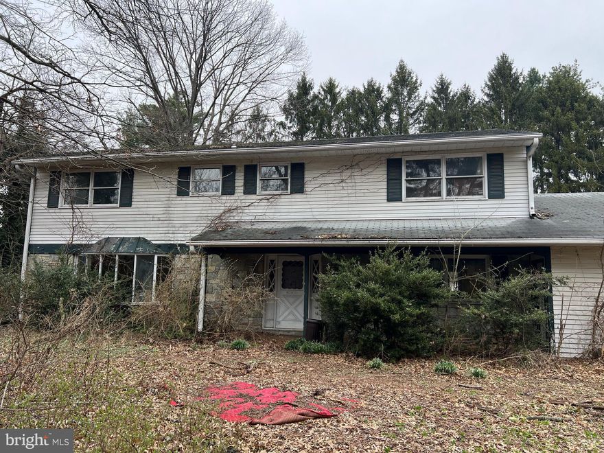 OFFER SUBMISSION DEADLINE OF WEDNESDAY, MAY 14TH 9 AM.  
Bank-Owned Property with Tremendous Potential!
This spacious 5-bedroom, 3 full bath home is ready for a COMPLETE renovation — perfect for an investor or buyer with a team of skilled workers.  The main level features a large family room open to the kitchen, a formal dining room, formal living room, and a sunroom that fills the space with natural light. The foyer welcomes you with a stunning curved staircase. Upstairs, the primary suite boasts a fireplace, walk-in closet, and a private balcony overlooking  the backyard.  Generously sized bedrooms, most with walk-in closets, provide plenty of space for family or guests. Additional highlights include a main-level laundry room with backyard access, a bedroom and full bath on the main level, a full basement and a 2-car garage.  A new fence has been installed around the pool.  Located off of 11-15 the nearly 1 acre lot is completely private.  With its prime layout and private setting, this home offers a rare opportunity to transform it into something truly special!