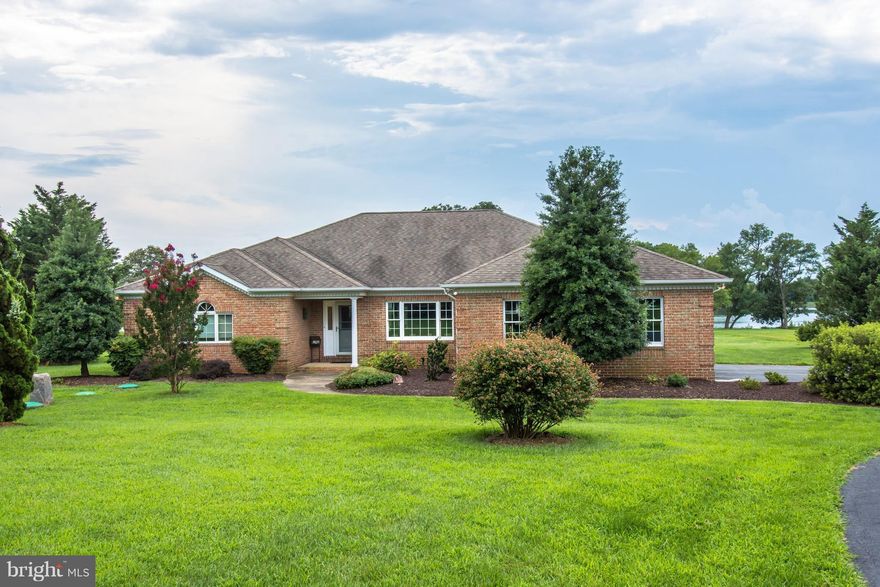 Beautiful tranquil setting, with all brick home on Northwest Creek. One floor living at it's best! Splendid layout for entertaining, or everyday living. Tremendous upgrades thru-out, including Gourmet kitchen, Trex deck, paver walkway, patio and porch. Spacious, open master bedroom opens to sunroom & French travertine floors. Water views from most rooms 10 minutes to bridge, shopping, church!