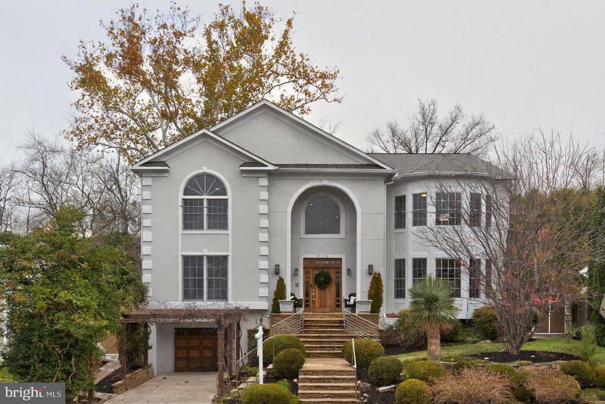 *** Come and Join us! Open House Sunday 1/4, 2:00pm - 4:00pm ***  The perfect home for entertaining - see it in action, move in ready for the Holidays! *** ENTERTAINER’S DREAM in the beloved Wyngate Community!  Just one block from Bull Run Greenway and three blocks to the Wyngate elementary school, parks and field, this spectacular home offers 6,000+ square feet of beautifully designed living space.
Step inside to a soaring two-story entry and dual modern staircases setting an impressive tone. The spacious chef’s kitchen with it's cozy fireplace, flows seamlessly to the backyard bar and grill area—ideal for gatherings of any size. Formal and informal dining rooms, multiple entertainment spaces, and cozy nooks throughout provide a perfect party house for hosting.

A rare first-floor bedroom suite serves as a second primary—ideal for aging parents, extended family, or guests seeking privacy. Each of the generous bedrooms throughout the home include their own ensuite bath.

The upper-level outdoor terrace is truly exceptional, offering serene treetop views from both the primary suite and an adjacent bedroom.

The lower level is built for fun and functionality, featuring a bar, billiards room, yoga studio, two guest-friendly entry points, along with two additional bedrooms.

This is a home designed for comfort, luxury, and unforgettable entertaining.