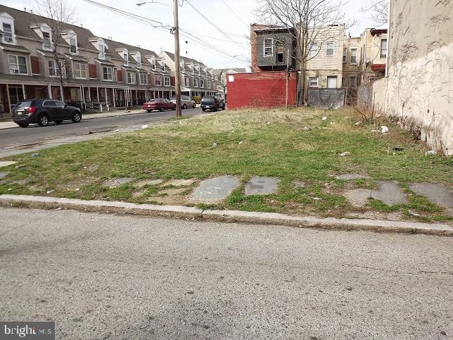 Vacant building lot. Area about 1000sf. Also for sale is the adjacent corner lot under separate listing. Drive by showings only.