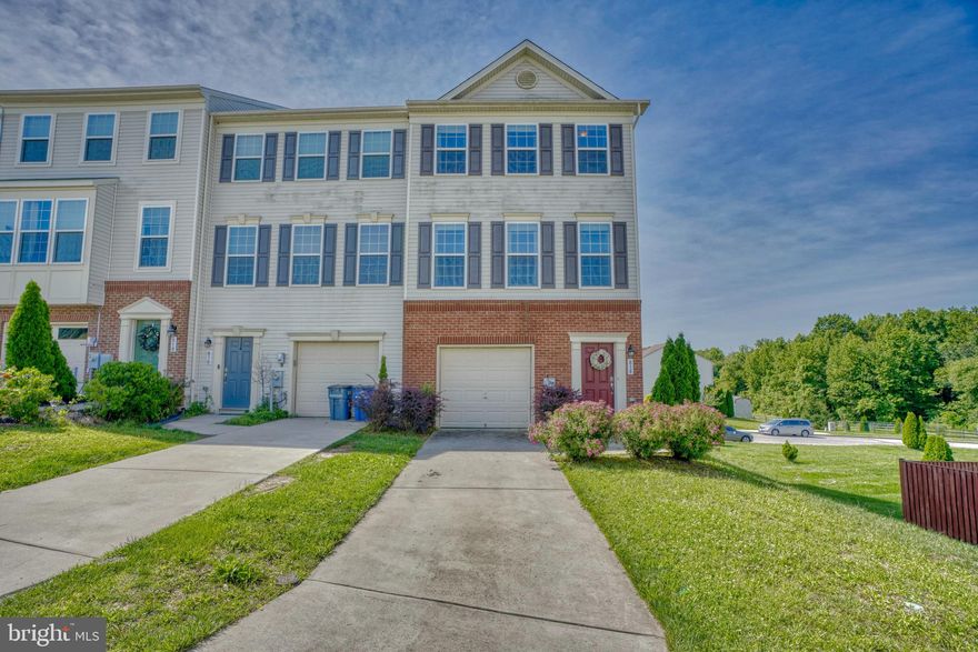 WONDERFUL END OF GROUP 3-STORY GARAGE TOWNHOME IS ONLY 8 YEARS OLD AND BOASTS SOARING CEILINGS, NEWER FLOORING AND WINDOWS GALORE PROVIDING GREAT NATURAL LIGHT!  MAIN LEVEL ENTRY LEADS TO GARAGE ACCESS AND HALL TO CLUB ROOM SPACE WITH NEWER VINYL FLOORING AND SLIDER TO WALK OUT PATIO AND BACKYARD. UPPER LEVEL 1 /MAIN LEVEL OFFERS BRIGHT LIVING ROOM WITH NEWER VINYL FLOORING, HALF BATH, LARGE PANTRY, LAUNDRY AND SPACIOUS, OPEN KITCHEN AND DINING SPACE WITH BREAKFAST BAR/ISLAND, 42" CABINETRY, STAINLESS STEEL APPLIANCES AND SLIDER TO NEWER MAINTANCE FREE DECK! UPPER LEVEL 2  INCLUDES PRIMARY BEDROOM WITH WALK IN CLOSET AND PRIMARY FULL BATHROOM, 2 ADDITIONAL BEDROOMS AND 2ND FULL BATHROOM.  BRAND NEW DRYER. ALL OTHER SYSTEMS 8 YEARS YOUNG! QUIET COURT LOCATION BUT JUST MINUTES TO I-95. DON'T DELAY! SCHEDULE YOUR SHOWING TODAY!