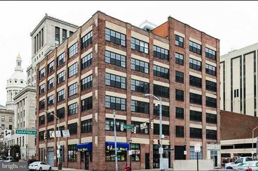 Renovated loft in Breco Building with GARAGE PARKING. Downtown location offers immediate access to everything the city has to offer -- waterfront, restaurants, cultural district, and all modes of transportation. Granite counters, stainless steel appliances, and a wall of windows looking out over the city. Secure building with modern loft design.