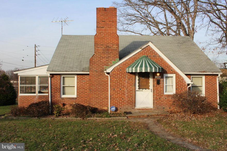 This charming Cape Cod has so much potential. It is located on a huge corner lot.  House has original hardwood floors on the main level.  Has newer hot water heater and furnace.