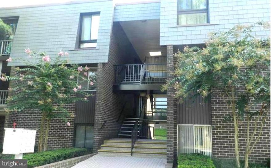 Back on the market and beautifully renovated - absolutely move-in ready! Open floor plan for the way you want to entertain today! Custom cabinetry in kitchen & bath. Granite counters, S/S appliances, center island. Brand new flooring thru-out! Private entry and exit right from your patio! Parking is a breeze. Lovely views. Enjoy the pool! Wonderful community conveniently located off 695.