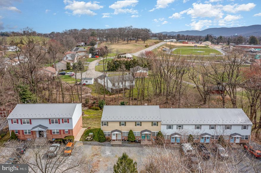 RARE INVESTMENT OPPORTUNITY! 16 units split in 2 buildings, all occupied and generating steady income. One building holds 6 apartments and the second building has 10 townhomes. All units are 2 bed, 1 bath. The townhomes have an additional half bath in the units and also basements. Property is kept in great condition, with new roof installed in 2021 as well as back sidewalk. Current gross income is a little over 124K/year with space to grow as rents have not been increased.  Tenants pay for their own utilities, Landlord pays for Water, sewer, trash. Make this amazing property yours today before its gone. See remarks for additional information. OFFER RECEIVED! DEADLINE FOR ALL OFFERS IS SET FOR APRIL 5TH AT PM.