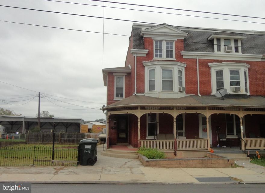 A bit of work will result in instant equity in this spacious home! Includes original architectural details such as plaster crown molding and pocket door as well as many updates like first floor laundry, full bathrooms on three levels and a finished basement with outside entrance.  Large side yard surrounded by wrought iron fence and detached garage as well as off street parking are also a bonus.  Garage was originally 2 car but one garage door was removed. Could easily be converted back to two car.  Sold as is.
