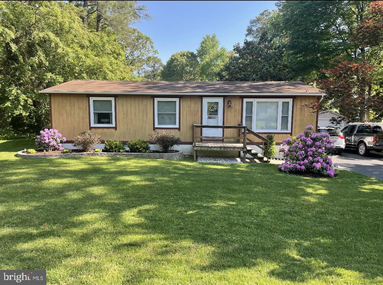 Immaculate Rambler on Level, Double Lot in Water Oriented Drum Point Community! 3 Spacious Bedrooms and 1 Bath; Kitchen with Table Space; Large Mud Room/Laundry Room; Huge 32' x 12' Detached Shed/Workshop with Electric; Level, Flat Backyard with Fence; Entertain on the Expansive 25' x 12' Deck with Built in Bench Seating or Relax in the Hot Tub! Plenty of Parking! Well was Replaced in 2017. Minutes to Route 4, Schools, Restaurants, and Shopping! Quick Commute to PAX NAS!
Previous Owner Merged Two Lots Together to Have One Large Lot - Close to Half an Acre!