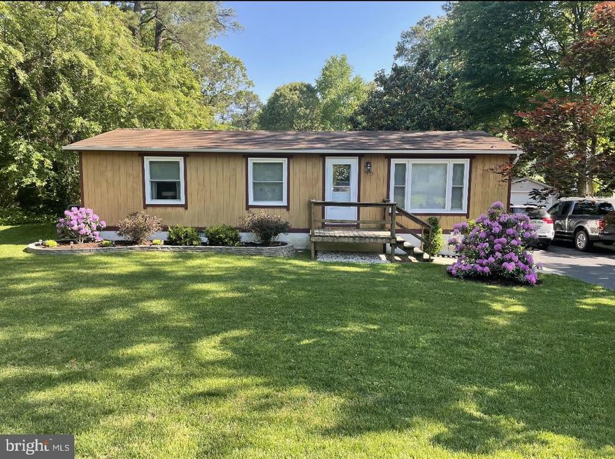 Immaculate Rambler on Level, Double Lot in Water Oriented Drum Point Community!  3 Spacious Bedrooms and 1 Bath;  Kitchen with Table Space;  Large Mud Room/Laundry Room;  Huge 32' x 12' Detached Shed/Workshop with Electric;  Level, Flat Backyard with Fence;  Entertain on the Expansive 25' x 12' Deck with Built in Bench Seating or Relax in the Hot Tub!  Plenty of Parking!  Well was Replaced in 2017.  Minutes to Route 4, Schools, Restaurants, and Shopping!  Quick Commute to PAX NAS! 
Previous Owner Merged Two Lots Together to Have One Large Lot - Close to Half an Acre!