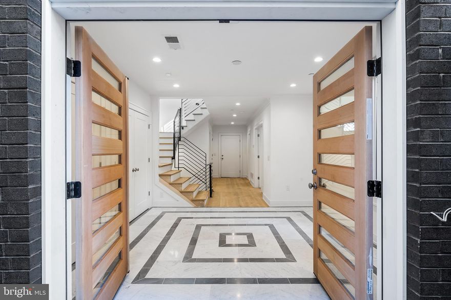 A true Philly Special. Welcome to 2407 Delancey, a meticulously designed and fabricated RARE NEW
CONSTRUCTION home featuring 4 beds, 6 baths (3full/3half) and approx 5400 sq. ft. of the finest
luxury living. Walk within minutes from everything the city has to offer and come home to your luxury
retreat. This 22ft WIDE home has a 2 CAR GARAGE, ELEVATOR, ROOF DECK and FULL 10 YEAR TAX
ABATEMENT (APPROVED) on DELANCEY PLACE in FITLER SQUARE only steps from Schuylkill River
Park! The expansive city skyline, western, and southern views from all angles are only believable in
person. Attention to detail, first class finishes, and amazing high end luxury on display at every turn
including: roof deck with panoramic views and glass railings (can accommodate hot tub), cooks
kitchen with Wolf/Sub-zero appliance package, waterfall island, built-up countertops, custom inset
cabinetry, custom white oak hardwood floors with herringbone pattern spanning entire living space,
large butler’s pantry with Sub-zero wine refrigerator, designer lighting and plumbing selections, lavish
wood trim, tons of storage, private study, bathroom on every level, custom tile, dedicated upper level
laundry room, high end windows, metal railings, tankless hot water heaters, 2 zone ultra-efficient
HVAC system, alarm, sprinkler system, 2 wet bars, linear gas fireplace, heated tile floors (master bath
and basement), smart home automation system, charging station in garage, and LANDSCAPED
PRIVATE GATED ENTRANCE/COURTYARD off Delancey Place designed by Roots Landscape Design.
World class design by TERRA DESIGN STUDIO and high quality, attention to detail construction by
GRIT CONSTRUCTION. Full, finished basement. Located in GREENFIELD catchment. Taxes are being
calculated by OPA to reflect tax on land only with all improvements abated. Taxes TBD. Listing agents
have ownership interest.