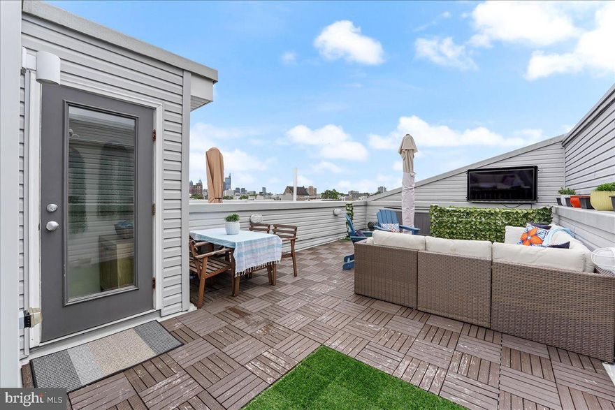 This house has so much detail and love put into it. Fully Finished basement you can use as a bedroom suite with gorgeous full bath with bronze accents. Parking included, behind house, off street.
Roofdeck has amazing views and gets wonderful sun.  Built-ins make the front room unique and cozy.  There are some finishing touches like a wet bar and coffee bar area, but you should just make it a point to view it in person.  Truly a home ready for your energy and new memories!  Located in a thriving community, you don't want to miss this opportunity to get in before the summer's over.

***65" TV case for your roofdeck will be left for tenants, GE Refrigerator , dishwasher and microwave.  Samsung Stove