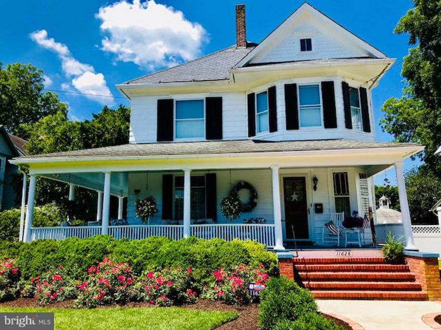 A GEM IN THE HISTORIC DISTRICT! PRICE DRAMATICALLY REDUCED! Nestled in the Heart of Princess Anne's Historic District is the John Holland House, circa 1902. This 2,392 sq.ft. Classic Victorian is 2 Blocks from Downtown Shops and Eateries and has been Meticulously Updated while keeping it's Historical Charm. The Welcoming Wrap-Around Porch offers Solitude and a Private Side  Eating Area. The Interior offers 3 Bedrooms and 2 Full Bathrooms. There are Hardwoods Throughout the House and the Living and Dining Rooms have the Original Pocket Doors. The Original Overhead Light Fixtures were Refinished and the Stained Glass Windows Diffuse the Intensity of the Morning Sunlight. The Slate Roof has been Meticulously Maintained. The House has been Updated with Central Heat and Air Conditioning Throughout. There is a Huge Walk-Up Attic with Storage Galore and a Partial Basement for Additional Storage. The Detached Garage and Carport originally housed Carriages and there is a Large Floored Open Space above the Garage that would be Perfect for an Office or Craft Room. The Front and Back Yards have an Underground Sprinkler System that Nourish the Lawn as well as the English Gardens. SELLER IS OFFERING A 1 YEAR AHS HOME OWNERS WARRANTY FOR BUYERS PEACE OF MIND. Let the History and Charm of this Updated Victorian Spoil You, YOU DESERVE IT!