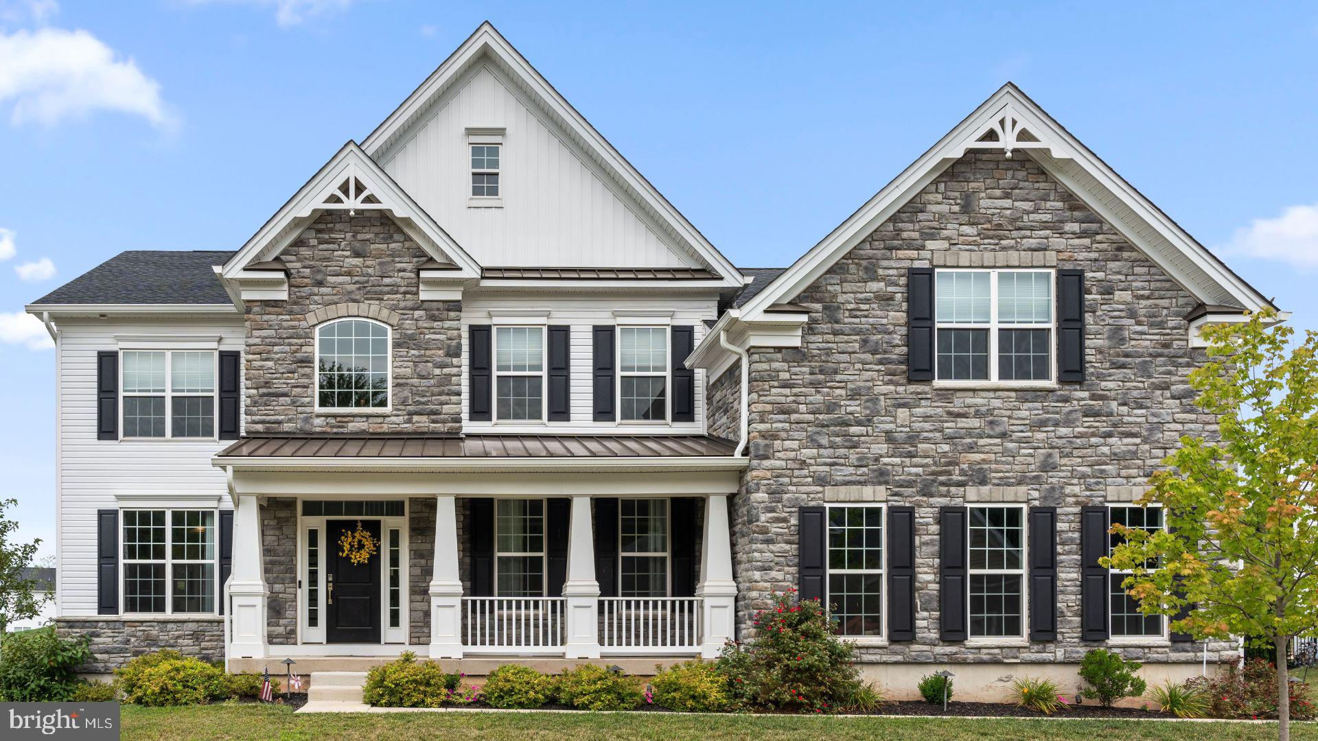 This exquisite home, built just three years ago by the reputable Toll Brothers in the Stone Mill community of Huntingdon Valley, offers a blend of luxury and comfort. The grand two-story foyer provides a stunning entrance that sets the tone for the home. The dramatic two-story great room features a secondary rear staircase and an inviting gas-burning fireplace, creating a cozy yet elegant atmosphere. The gourmet kitchen is equipped with a breakfast area, granite island and countertops, and stainless steel appliances, perfect for culinary enthusiasts. Formal living and dining rooms provide the ideal space for holiday entertaining.
The first floor includes a bedroom and full bathroom, convenient for guests or multi-generational living. The luxurious second-floor primary suite boasts a main bedroom, large sitting room/den, two walk-in closets, and an en suite bath with his-and-her vanities, a large bathtub, and a wide shower with dual shower heads, including a rain shower head. A princess suite with its own private bathroom and two additional spacious bedrooms that share a Jack-and-Jill bathroom complete the upper level.
The enormous unfinished lower level offers potential for a home theater or fitness room, with high ceilings providing ample space for customization. Additional features of this home include nine-foot ceilings on the first and second floors, hardwood flooring, a three-car side-entry garage, and two-zone heating and air conditioning. Builder-provided warranties on HVAC systems, the water heater, and the entire home add peace of mind.
Situated in the heart of Huntingdon Valley, Stone Mill offers easy commutes to Philadelphia, Princeton, and New York via I-95, the PA Turnpike, and Route 1. The community is within walking distance to Pennypack Trail and Mason Mill Park, with several golf and swim clubs nearby. The home is located within the top-rated Lower Moreland School District.