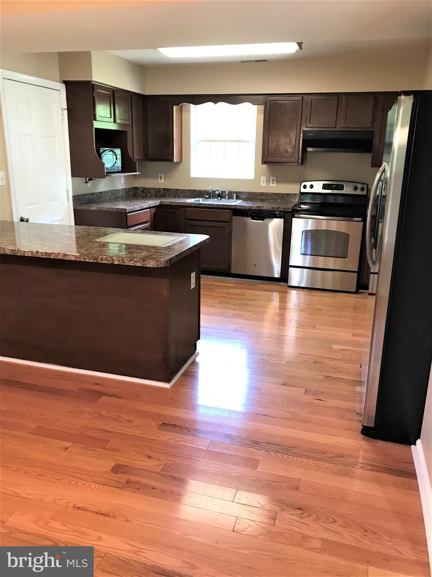 DEC. 2 , 2017 Update: LOOK WHAT WE DID!  9 NEW WINDOWS & CUSTOM PAINT IN LIVING ROOM & LOWER PRICE.  Beautiful home in Camelback.  3 Finished Levels, 3 BRs + Den/4th BR, 3.5 Baths. SS Appliances, Hardwoods, FP w/ mantel. HVAC 7yrs., ROOF 7 yrs., CARPET 3 yrs. SS Appliances 3yrs.  Paved Driveway leads to 1 Car-Garage w/ storage area.  Full Approval in 30 days,