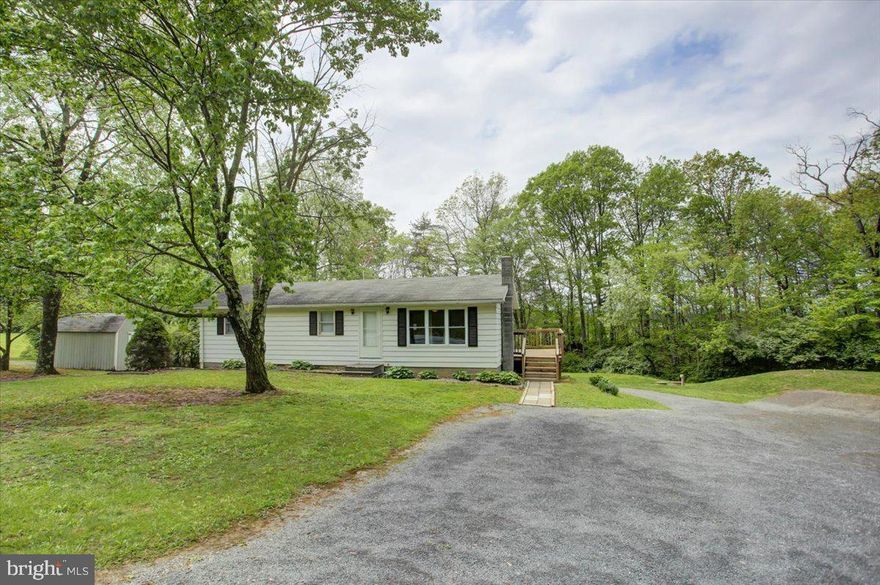 This charming 3-bedroom, 1-bath ranch home sits on a peaceful and partially wooded 1.25-acre lot, offering privacy and a touch of nature right in your backyard. Enjoy regular visits from deer and wild turkeys in this quiet, semi-secluded setting—perfect for those seeking tranquility.

Step inside to find fresh updates, including new carpet and paint in all three bedrooms, and updated light fixtures in the kitchen, hallway, and bedroom. The layout is functional and inviting, with a cozy living space and a kitchen that’s ready for everyday use or easy updates.

The basement has been recently waterproofed, offering a clean and dry space that’s ready for your personal touch—whether it’s a family room, workshop, or just some extra storage space.

If you're looking for a peaceful place to call home with room to grow and enjoy nature, this one is a must-see!  Call me today to schedule your personal tour.