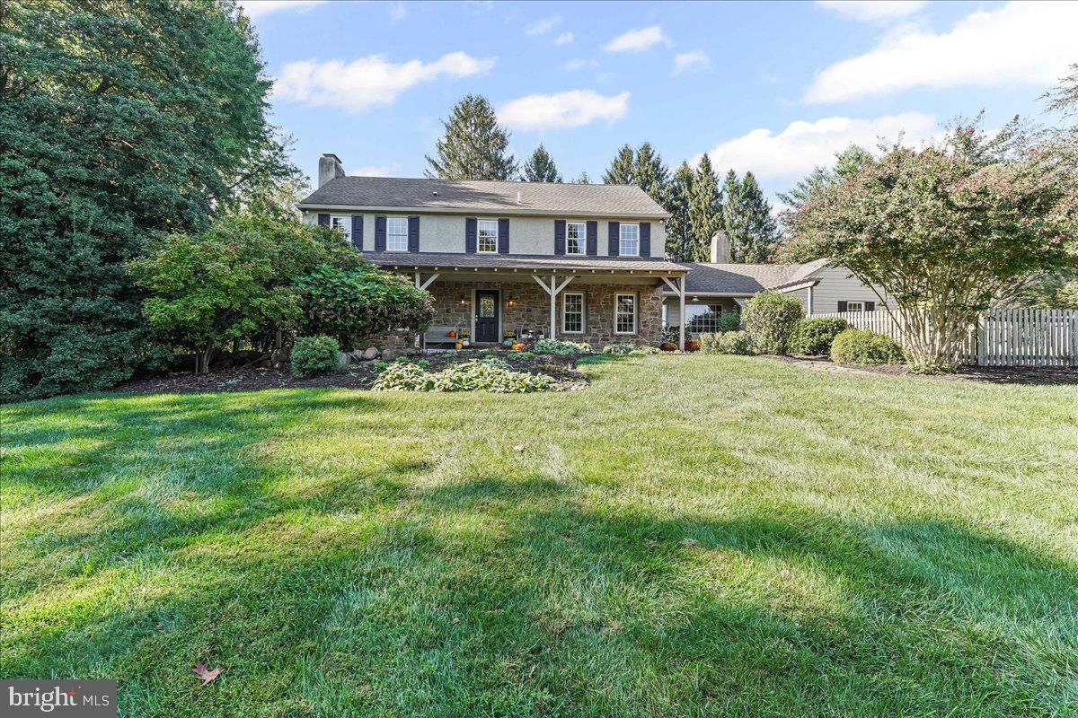 Welcome to 122 Round Hill Road! This exceptional 4/5 Bedroom 3 Bath, stone front home sits on three beautifully landscaped acres in the heart of Kennett Square, Chester County. Lovingly maintained and thoughtfully updated by its longtime owners, this home has an impressive list of improvements not found in homes selling at twice the price. Quality materials and timeless design come together to make a truly impressive home, with highlights that are too numerous to list but include a Gourmet Kitchen complete with wood burning fireplace, natural slate flooring, beamed cathedral ceiling and commercial grade appliances including a subzero refrigerator, Ducor six burner gas cooktop, double wall ovens, warming oven, beverage bar with undermount sink, and an impressive granite topped island with seating for six. Elsewhere on the 1st floor you will find a large Living/Family room with wood burning fireplace, a spacious Dining Room with Pella sliders leading to the bluestone patio, and a private Study with ensuite bath (This could be used as a 5th BR). Hardwood floors and solid cherry interior doors are found throughout. Upstairs you will find 4 Bedrooms and 2 Baths, including a Primary Bedroom with two custom closets and a newly renovated ensuite bath featuring stunning marble floors, a new tub/shower with Zellige tile and marble top vanity. Three additional bedrooms, all spacious, and a beautifully renovated hall bath, complete the second floor. Outside, attention to detail can be found in the meandering paver walkways and outdoor living areas which include an inviting covered front porch built with long lasting Ipe decking in the front of the home, and a charming bluestone patio to the rear. Professionally landscaped gardens provide year-round beauty, and the oversized 3 car garage and expanded circular driveway allow plenty of space for family and guest parking. If you are tired of cookie cutter homes and are looking for exceptional quality in a private, yet convenient setting, don’t delay This home won’t last long.