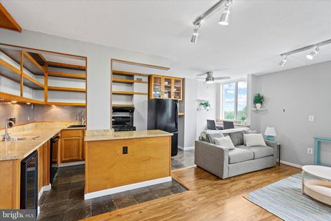 Photo of 4242 East West Hwy #406, CHEVY CHASE, MD 20815 (MLS # MDMC2196480)