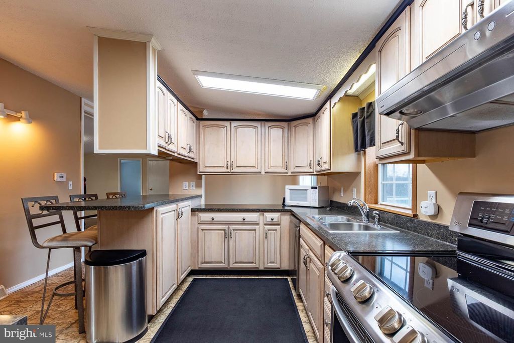 Photo of 56 Dorthea Street Extension, HOUTZDALE, PA 16651 (MLS # PACD2045010)