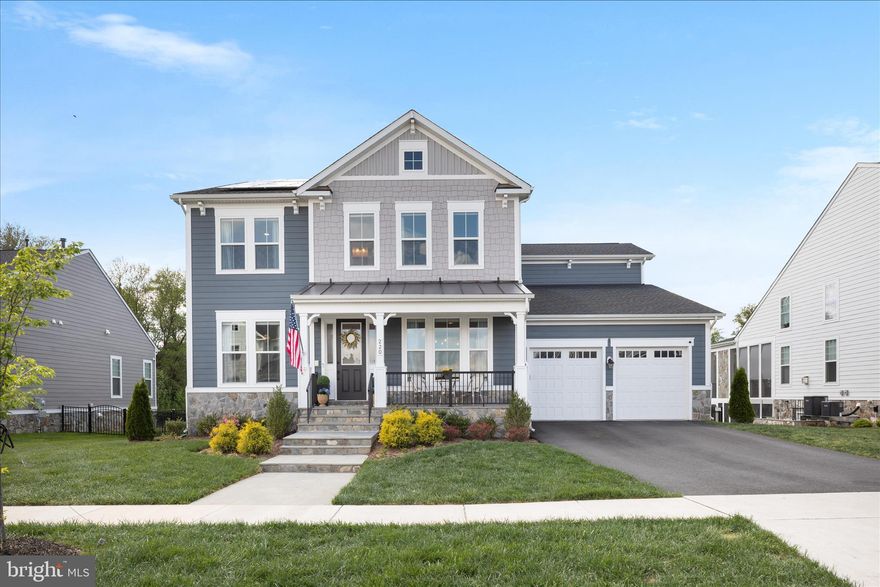 Welcome to this beautifully appointed Meadowbrook home, offering elevated, designer finishes and thoughtful design throughout. From the moment you step inside, the attention to detail is clear. Designer lighting, custom millwork, and intentional finishes create a polished, cohesive feel throughout. Just off the entry, a private home office with custom oak doors and built-ins offers a quiet, refined space to work from home, while the nearby dining room provides the perfect setting for both everyday meals and more formal gatherings. The heart of the home is a light-filled family room centered around a gas-burning fireplace, opening to a gourmet kitchen designed to impress. Featuring upgraded cabinetry, an oversized island, quartz countertops, upgraded stainless steel appliances, and a stylish butler’s pantry, this space is as functional as it is beautiful. Wide-plank LVP flooring runs throughout the main level, complemented by a custom mudroom with built-ins to keep everything organized. A highly sought-after main-level bedroom and full bath offer flexibility for guests, multigenerational living, or extended stays while still maintaining a seamless flow for everyday living. Upstairs, the primary suite offers a true retreat with a sitting area, LVP flooring, dual walk-in closets, and an upgraded bath with dual vanities, soaking tub and an oversized shower. Three additional bedrooms complete the upper level, with two sharing a Jack-and-Jill bathroom and the third featuring its own en suite bath, along with a conveniently located laundry room with built-in cabinetry for added storage and organization. The finished lower level adds even more flexibility, with a spacious Rec Room, sixth bedroom, and full bath, ideal for guests, entertaining, or everyday living. Situated on an expansive, premium lot backing to common space, the fully fenced yard is a true blank canvas, ready for whatever you envision—whether it’s a future pool, patio, or simply open space to enjoy. The home is also equipped with a solar panel system, offering long-term energy savings and increased efficiency, an increasingly valuable feature that helps offset utility costs while adding to the home’s overall sustainability. Featuring over $150K in upgrades throughout - including solar panels ($52K), custom woodwork and built-ins ($25K), fence ($9K), exterior uplighting ($2K), upgraded cabinetry & flooring, designer lighting & mirrors, and more! Meadowbrook residents enjoy community amenities including a pool, tennis courts, and tot lots, all just minutes from downtown Leesburg. With easy access to Route 7 and the Dulles Toll Road, commuting is convenient. Spend weekends at the Leesburg Farmers Market, explore nearby parks and trails at Ida Lee Park Recreation Center, or head to Village at Leesburg for dining, movies, and everyday essentials like Wegmans. Enjoy everything Leesburg has to offer just minutes from your doorstep. Be sure to check out the video to experience this exceptional property!
