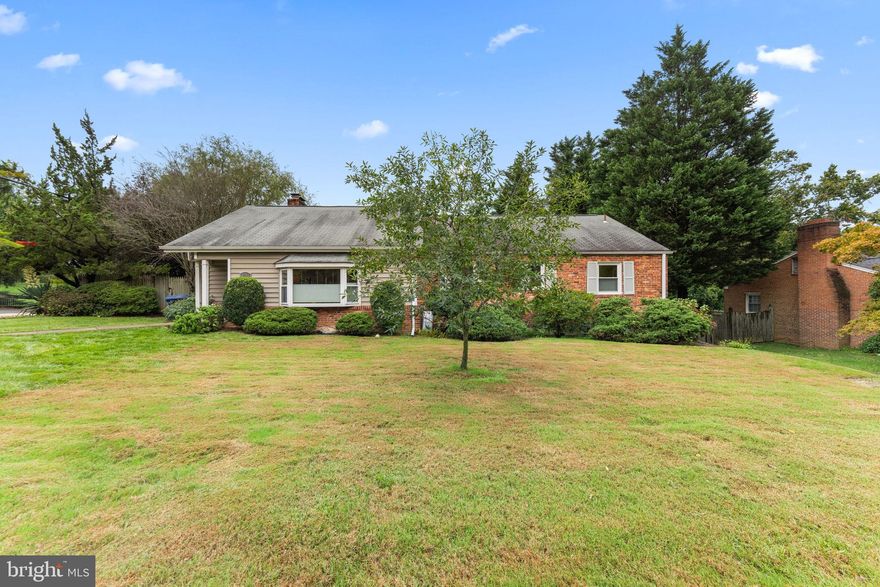 Spacious rambler on almost a 1/3 acre lot with 4  bedrooms and 4 baths.   More interior photos coming this week.  It has been thoughtfully expanded over the years adding a living room with cathedral ceilings, a sunroom/sitting room off the kitchen, and a huge family room with a fireplace which could also be a primary bedroom with its en suite bath and large closet.   The kitchen was updated in the 2000s with 42-inch cherry cabinets and stainless appliances.   Just off the sitting room you will find a private deck overlooking the garden. There are 3 more bedrooms on the main level, one with its own full bath and a full hall bath.  Gleaming hardwood floors and recessed lighting throughout.  The lower level makes a great in-law suite with a large rec room, kitchenette, and full bath.    Rear loading, extra deep garage.  Main level and lower level laundry facilities.  The home is in great shape but selling AS IS because it is an estate.

Just a couple of blocks from Glebe Road Park, and 1 mile from Chain Bridge -- easy commute to Georgetown, DC, Bethesda or McLean.  Neighborhood includes dozens of new builds from $2,000,000 up to $5,000.000.