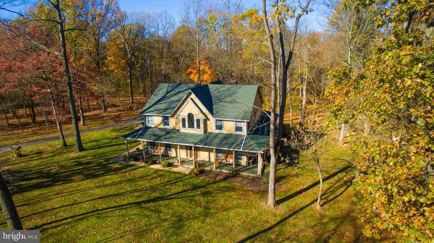 The Falling leaves make for a beautiful portrait on this wonderful farm style home snuggled in the woods outside Historic Shepherdstown, close to the Potomac River and town amenities. All the features you look for are here. Welcome home!.You will want to spend ALL your time enjoying the inside and outside relaxation and enjoyment areas. A one of a kind home awaits you!