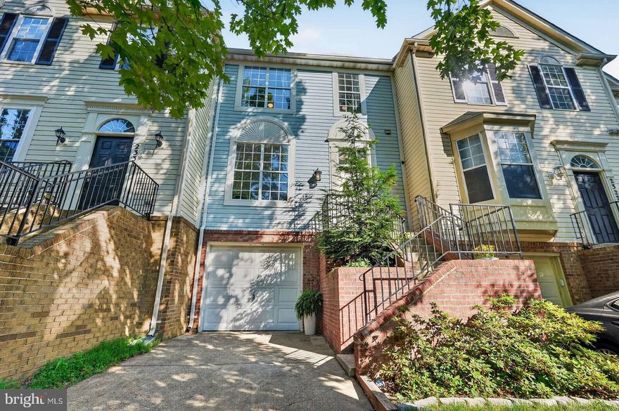 Welcome to 2329 Massanutten Dr, a beautifully updated townhome in the highly sought after Longmead community. Step inside to an inviting open floor plan on the main level, with new LVP flooring throughout. Just off the foyer, you’ll find a convenient powder room and coat closet. The bright living room offers crown molding, abundant natural light from two large windows, and a breakfast bar opening to the updated kitchen. The kitchen features granite countertops, stainless steel appliances, ceramic tile backsplash, plenty of cabinets, a pantry, two windows looking out to the deck, and wall openings to the living and dining rooms. The dining room, off the kitchen, has beautiful chair railing and crown moldings, wall sconces, and sliding glass doors leading to a spacious deck with stairs to the patio below. Upstairs, there are 3 large bedrooms, all with LVP flooring. The primary bedroom has vaulted ceilings, a walk-in closet, plenty of natural light, and an en-suite bathroom with a skylight, linen closet, ceramic tile flooring, and a tub/shower combo. An additional full bathroom, off the hallway, with LVP flooring and a tub/shower combo serves the other two bedrooms. On the lower level, the versatile recreation room features new carpeting, two windows, and a gas fireplace. There is also a laundry room, access to the garage, and a large storage closet with a rough in for a future bathroom. Longmead is a well maintained community with great amenities including two pools, a clubhouse, paved walking trails, tennis courts, and tot lots. Quick access to ICC 200 and Glenmont Metro Station (red line). Top public and private schools, Northwest Golf Course, Argyle Country Club, Aspen Hill Club, East Norbeck Local Park, churches, medical facilities, and shopping centers are just a short drive from the neighborhood. (Furnace - 2022) (Roof - 2019) (Deck - 2015) (Carpets - 2026) (LVP - 2025) (Radon remediation system)