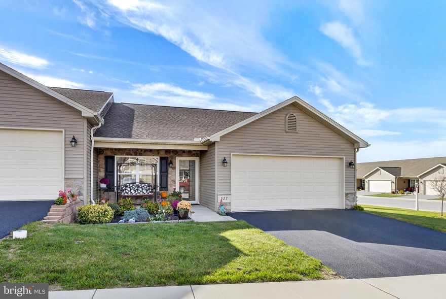 Beautifully maintained, one-owner luxury condo in The Paddock at Equine Meadows, a desirable 55+ community offering comfort, quality, and convenience. This sought-after model provides a spacious, open layout featuring two bedrooms and two full baths on the main level, including a generously sized owner’s suite with a newly upgraded bath showcasing a walk-in tile shower with glass doors and a pebble-stone floor. The second full bath has also been beautifully remodeled to include a soothing soaking tub, perfect for relaxation.  As an end unit, this home is filled with natural light from additional windows and enhanced by neutral décor and luxury vinyl plank flooring throughout. The kitchen is a showstopper, featuring granite countertops, a center island, a spacious pantry, and brand-new stainless-steel appliances. The inviting sunroom adds even more living space and light, leading to the deck, ideal for relaxing or entertaining.
The finished lower level provides incredible flexibility, offering a third bedroom, half bath, office, exercise room, and a large family room—perfect for guests, hobbies, or multi-purpose living. Every detail has been thoughtfully upgraded, including custom window sills, a solar-powered ceiling night light, new cabinetry in the laundry room, and a sleek epoxy-coated garage floor. Additional enhancements include an oversized water heater and a whole-home air filtration system, ensuring comfort and efficiency throughout.
Enjoy truly low-maintenance living. The association covers lawn care, snow removal, and exterior maintenance, including roof and siding. Residents also enjoy access to the community clubhouse, which features a gathering area for events, a fitness center, and a library—all just steps from your door.
Conveniently located near shopping, dining, and local conveniences in Red Lion and Dallastown, this home combines elegance, ease, and peace of mind. You must see all of the thoughtful upgrades to fully appreciate the quality and care this home offers. Move-in ready and waiting for its next proud owner!