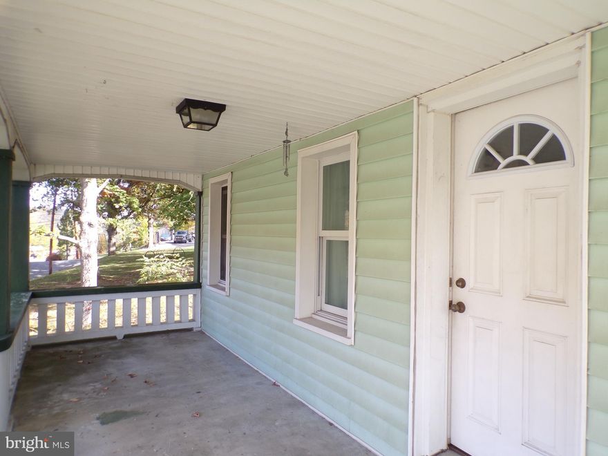 Situated on over 2 acres of land, with a little work and imagination, this home could be great home at a reasonable price.  Signs of the good ol' days still show in this home but there aren't many homes available located out of town within a short drive shopping, restaurants, and more. Outdoor features such as the front porch that spans the entire front of the home to the partially wooded back yard will provide plenty of places to spend your time.  There are even  2 outbuildings and a single car garage.  Inside, both bedrooms upstairs have walk in closets. One bedroom has a sizable sitting room with another large closet. and the other has a quaint out-cove perfect for a reading nook, office /desk area, or other possibilities.  The dining area is located just off the kitchen with a large opening to the living room for easy entertaining.  The wiring and plumbing hookup is accessible for the dishwasher that was removed. Washer and dryer hookup are located in the basement.