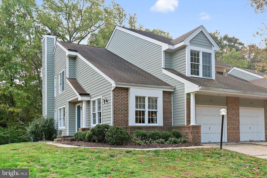 This cozy yet spacious, coveted end unit in the Spring Place section of Riva Trace will be your Annapolis retreat.  Riva Trace is a lovely place to live! Residents enjoy the walking trails that lead to the dock on Gingerville Creek. Grab your paddle board or kayak and head out onto the creek and into the South River.  This home has several spaces to gather with both a living room and family room on level one and an additional recreation room on the lower level.  A fun wet bar in the lower level is perfect for parties and movie nights.  The white kitchen with granite counters and stainless appliances has plenty of counter space and storage.  There is room for a cafe table and the adjacent room can be either the dining room as shown, or the family room.  The owner's suite on level two is spacious enough for a king bed.  The ensuite bath offers a large soaking tub, stall shower, dual vanities and walk in closet.  Tons of windows bathe the home in sunlight, but the tree cover in the rear adds a nice amount of privacy.  Host a fall dinner party beside the fireplace and meander out to relax on your private deck. Riva Trace is close to all commuting routes and various shopping centers as well as Historic Downtown Annapolis.  Your new Annapolis life awaits! (Be sure to check out our virtual walk through tour)