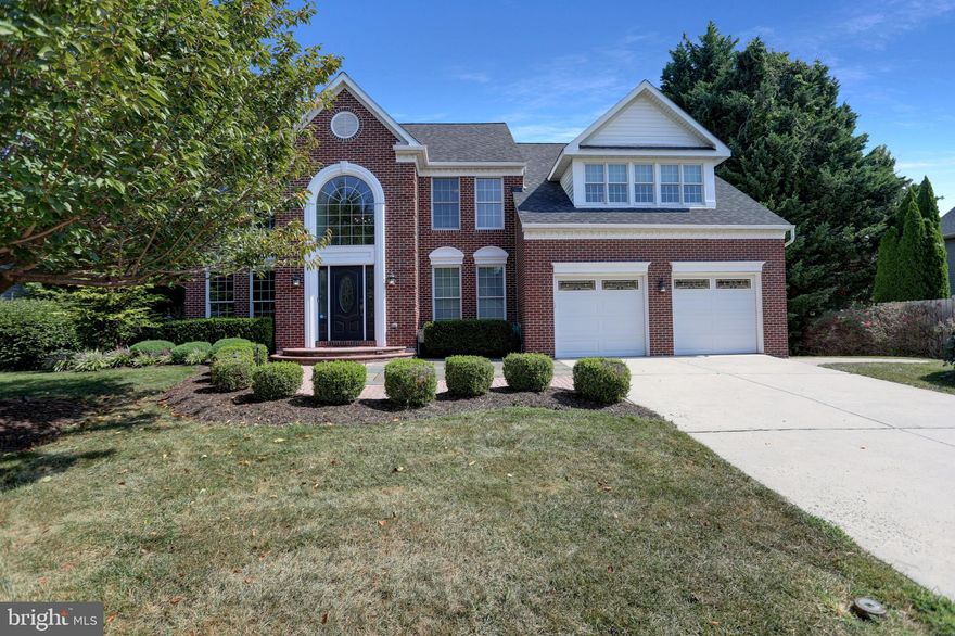 This Stunning Brick Front Colonial is located in the Highly Sought After Brierhill Estates Community.  This move-in-ready home offers a perfect blend of modern updates and traditional charm. With its spacious layout, beautifully renovated kitchen, and outdoor entertainment spaces, it's an ideal place to call home.  As you step inside from the brick and flagstone entrance, you’re Welcomed by a grand two-story foyer. Gleaming Hardwood floors flow throughout the main level, which has been thoughtfully updated. The Renovated Gourmet Island Kitchen is a highlight, featuring Black Galaxy Granite Counters, a Tiled Backsplash, Glass Front Custom Kraftmaid Cabinets, Stainless Steel Appliances (including a 5 Burner Gas Range with Griddle, Microwave, and Dishwasher). Pull Out Shelf Pantry, pull out spice rack, Beautiful Soft Close Maple Glazed Cabinets, a Double Sink and Recessed Lighting.  Adjacent to the kitchen, the two-story family room boasts a Gas Fireplace with a Custom Copper Mantle, creating a cozy ambiance on cool evenings.  The formal Living and Dining rooms provide additional space for entertaining.  An atrium door with encased dust free blinds off the kitchen leads to an Expansive Trex-lighted deck and Screened gazebo for outdoor enjoyment.  Upstairs, Overlooks the front foyer with Palladian Window and 2-story family room with extended height railing. Enter into the Bright and Spacious Primary Suite with Crown Molding and a Sitting area featuring five windows.  The Primary Suite also includes a walk-in closet and a stylish en-suite bath with free-standing soaking tub, two vessel sinks in Custom vanity and a Separate Tiled Shower.  Three more generously sized bedrooms and a full main hall bath with a shower/tub combination are down the hall, along with the convenience of a large laundry room on the bedroom level.  The lower level adds more living space with a finished recreation room, complete with a built-in wet bar, dishwasher, mini fridge, as well as an additional full bath and large storage room.  Walk out of the basement to a stamped concrete patio with a pergola, lighted stone wall, and a level fenced yard.
Don't wait, this Move in Ready beauty won't last.  Schedule your showing appointment today!