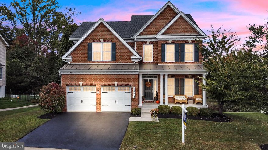 Exquisite Toll Brothers Home in Arundel Forest on Premium Lot!!!
Welcome to this beautifully maintained Woodstock model by Toll Brothers, located in the highly desirable Arundel Forest community on one of the best lots in the neighborhood!
Step into a bright, two-story foyer that flows into formal living and dining spaces. The gourmet kitchen features granite countertops, brand-new stainless steel appliances, ample cabinetry, and an oversized breakfast bar. It opens to a spacious family room with vaulted ceilings, a wall of windows, and a cozy gas fireplace.
Enjoy the sunny solarium with serene wooded views, leading to a deck and a custom stone patio—complete with built-in fire pit, grilling area, bar, and space for outdoor dining—perfect for entertaining.
Main level also includes a versatile flex room (ideal as bedroom or office), powder room, laundry, and mudroom.
Beautiful engineered hardwood flooring. 
Upstairs, the luxurious primary suite boasts a sitting room, dual walk-in closets, and a spa-like bath with soaking tub, frameless shower, dual vanity, and private water closet. Three additional bedrooms share a full bath with dual sinks. Open hallway overlooks the beautiful foyer.
The finished basement is a showstopper with exposed beams, a custom reclaimed wood bar, karaoke system & TV (included), and a huge rec room. Plus: two bonus rooms (used as a gym and guest room) and a full bath—ideal for guests or extended stays.
New carpet.
Located in a resort style community with great amenities ( outdoor pool, clubhouse, playground (2), walking trails) and convenient access to major routes 295, 95, 100, 32, shopping, entertainment. Minutes from Ft Meade, NSA, National Business Park. Centrally located between Baltimore, Annapolis and Washington DC. 
Don’t miss this rare opportunity! Please refer to floor plan for sq footage of each floor.