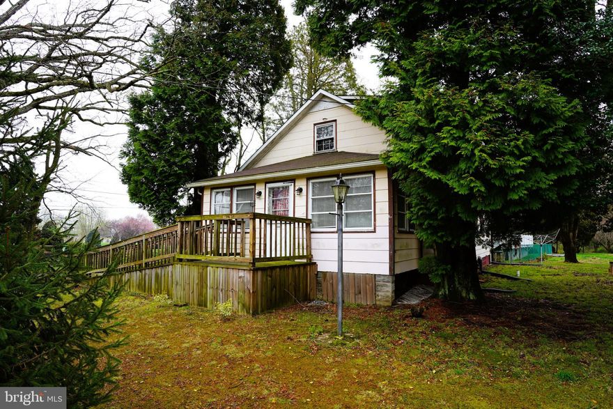 Opportunity awaits on Chapel Road! This Cape Cod-style detached home located is in the Havre de Grace area of Harford County But not within the city limits. It sits on a generous 1.79-acre lot (per public records)

The home offers 1,196 square feet above grade with a traditional layout that includes a porch entry, living room and dining area with hardwood floors, kitchen, two main-level bedrooms, and a full bath. The upper level features a half bath and provides potential for a future primary bedroom suite. An unfinished basement adds additional storage space and access to mechanical systems.

Outside, the property offers a variety of features including a fenced rear yard, a 15x24 above-ground pool and no HOA restrictions. A standout feature is the large detached outbuilding with electric service and a wood stove—ideal for hobbies, workshop use, or additional recreational space.

This property does need work and is being sold as-is, but presents a great opportunity for buyers looking to make improvements and build equity on a sizable lot with flexible outdoor space.