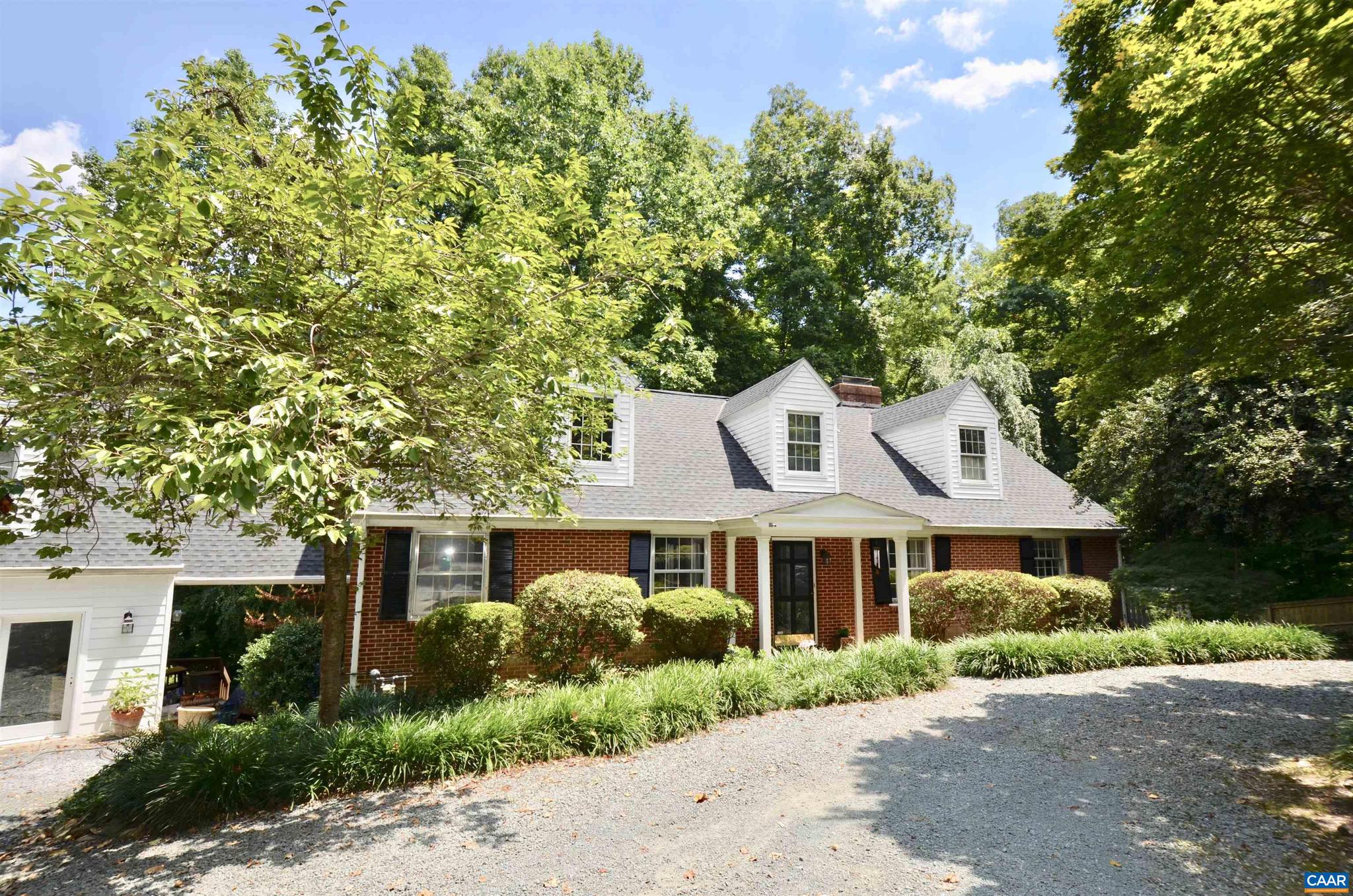 Hidden down a lane near UVA & Barracks Rd shops, find the ultimate in-town compound with privacy & flexible space on .92 acre! Enjoy nature at home & in the guest house. This gracious classic compound encourages entertaining both indoors and on 3 decks. Enjoy multiple primary suites, kitchens and bathrooms, three decks overlooking woods, creek & wildlife. Proven high income possible from one or more AirBnBs while living in main house. Great storage, closets & off-street parking.,Granite Counter,White Cabinets,Wood Cabinets,Fireplace in Great Room,Fireplace in Living Room