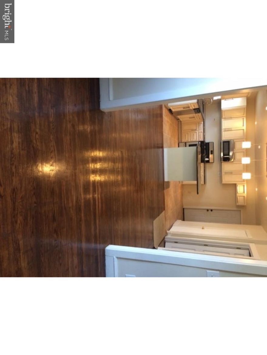 Completely rehabbed property with hardwood floors downstairs and wall to wall carpet upstairs. A nice side back yard for entertaining and fun. Open concept kitchen over looking the dinning room. There is also a front porch for relaxation.