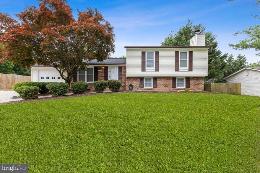 LARGER THAN IT LOOKS!!! Welcome home to 8505 Heatherwick Drive! This beautiful home is unique with many features that you won't find in most split-level homes. The rear has been extended to allow for an oversized primary bedroom with a private deck overlooking the huge backyard and swimming pool! It also added space on the lower level for a large 4th bedroom with its own private entrance. It's a great opportunity to earn additional income as the large family room and remodeled full bathroom make it the perfect space for an in-law or friend. There is plenty of room for everyone in the home to be comfortable!  The main level living room has gorgeous hardwood floors and opens to the tastefully updated kitchen with granite countertops, new cabinets, stainless steel appliances, and tile floors. Relax on the second deck or entertain in the very large, flat backyard with a firepit just off of the kitchen. The upper level features three spacious bedrooms with new carpet, paint, and fixtures, as well as two remodeled full bathrooms. Newer windows have been installed in the front of the home and a new roof was recently added! There is also a brick wood-burning fireplace for those cold winter nights! Park multiple vehicles with the attached garage, driveway, and street. Conveniently located within minutes from DC, VA, AAFB, the metro, the National Harbor, parks, and lots of shopping and entertainment! This home is priced to sell and won't last long. Don't miss your opportunity to be the proud new owner of this beautiful home! Be sure to check out the virtual tour as well!!