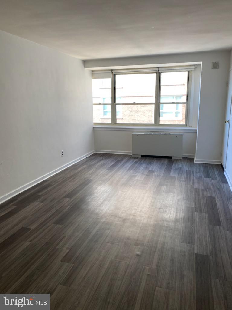 Perfectly sized studio with south-facing views on a high floor of The Savoy on Rittenhouse Square. This home features gray vinyl flooring throughout; a fully equipped kitchen with white shaker cabinetry, granite countertops, and white appliances; and a spacious bathroom with a like-new vanity, light fixtures and white tiling. Additional highlights include excellent natural light in the living area and ample closet/storage space. Residents of The Rittenhouse Savoy enjoy a 24-hour doorman and fitness center, as well as prestigious location on the south side of Rittenhouse Square.