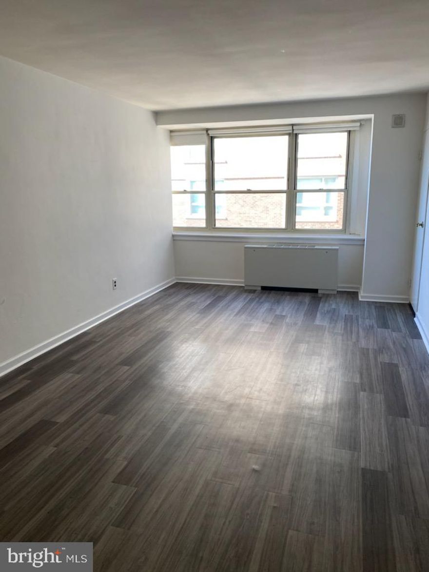 Perfectly sized studio with south-facing views on a high floor of The Savoy on Rittenhouse Square. This home features gray vinyl flooring throughout; a fully equipped kitchen with white shaker cabinetry, granite countertops, and white appliances; and a spacious bathroom with a like-new vanity, light fixtures and white tiling. Additional highlights include excellent natural light in the living area and ample closet/storage space. Residents of The Rittenhouse Savoy enjoy a 24-hour doorman and fitness center, as well as prestigious location on the south side of Rittenhouse Square.