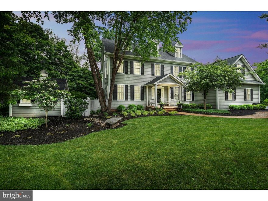 Nestled at the end of the Sprucefield cul-de-sac, a small enclave of only seven Ferman Lex homes, this fine residence offers discriminating buyers the perfect opportunity to be at home.  Featuring custom millwork, transoms, moldings and built-ins, the main floor welcomes you in traditional style with formal living and dining rooms, open staircase and main-floor office.  The open concept kitchen, breakfast and family room all face the rear of the house with walk-out to the raised rear deck, taking full advantage of the wonderful wooded setting and near treetop views.  Abundant windows and skylights create a bright space that accents hardwood floors, newly renovated chef's kitchen with professional appliances and a tasteful color palate.  The hardwood floors are carried up to the second level halls and master bedroom suite.  The master is oversized to accommodate large furnishings and sitting area.  The spa-like master bath is a custom creation with freestanding soaking tub, large open shower and walk-in closet built for two.  The second and third bedrooms share a Jack-N-Jill bath, with access from each.  The finished lower level adds appoximately 1,000 square feet of quality living space, and is the perfect entertaining area complete with wine storage, wet bar with counter seating, and built-in entertainment nook, as well as fourth bedroom and full bath.  From the lower level, walk out onto the brick patio for expanded outdoor living space.  Notable are plantation shutters through the main floor, main-level laundry/mud room, brand new roof, expansive side yard, outdoor storage shed, maintenance-free Hardiplank siding and manicured landscape.  Walk-up third floor is plumbed and ready to be finished into an additional suite, playroom or guest quarters.  Easy walk to New Hope, close to all amenities, and very commutable location to Princeton, NYC and Philadelphia. Special financing incentives available on this property from SIRVA Mortgage.