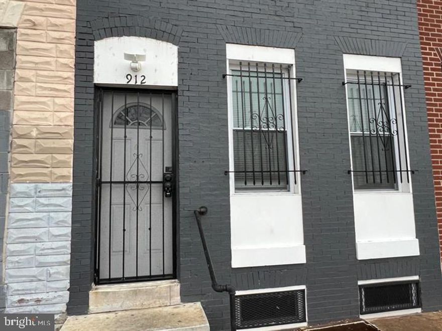 REDUCED to only $89,900! Bank wants sold. Submit all offers.  Great Hidden Gem Neighborhood.  Only House on whole block with nothing across street from it.  Easy in and out of Baltimore for commuting.  A hidden Gem for Investors!
 Excellent opportunity to own this completely renovated, 4 level rowhome, on intimate, quiet, block. This completely renovated home features: 9 ft ceilings, recessed lighting, open concept main floor plan with updated kitchen and stainless appliances, granite counter tops, beautiful tile backsplash, skylights, 2 Full Ceramic Tile baths, 3 spacious bedrooms with generous closets, storage space, Great City Views from Upper levels and so much more all in a convenient, pedestrian friendly location. Property has newly installed central ac system and unfinished basement has hookup for washer/dryer.  Home is near M&T Stadium and Camden Yard.  Property is in need of roof repairs and some water intrusion, no electricity bring a flashlight.  Seller is motivated bring all offers. Call Listing Agent with any and all Questions.