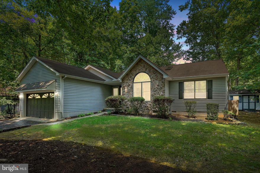 Beautiful 3 Bedroom, 2 Bath Rambler with a 2 car attached garage in the sought after gated community Lake of the Woods. This home features new paint, new toilets, new carpets, freshly power washed, and extensive  landscaping. The Owner Suite includes a walk in closet, large bathroom with handicapped accessible shower, and a private entrance to the screened in porch and deck; while the remaining 2 bedrooms are located across the home for ultimate privacy. This amenity filled neighborhood includes two lakes, the main lake being 550 acres and a smaller fishing lake; 18 hole Golf Course, Golf Clubhouse, Community center, Pools, Fitness center, Equestrian center, Fire & Rescue, Main Clubhouse overlooking the Lake, walking trails, picnic and common areas, and so much more! Schedule a showing today!