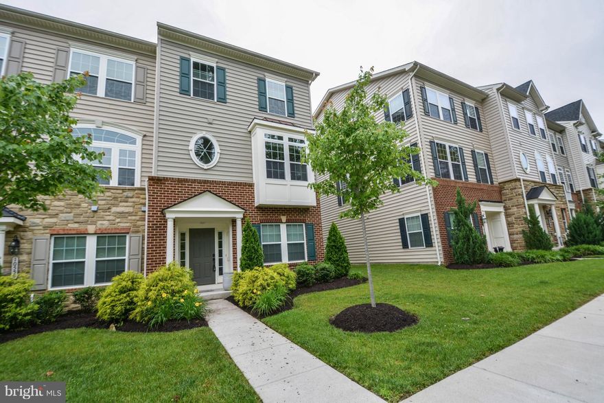 Beautifully maintained & spacious end townhouse. Gourmet kitchen w/granite counter tops, stainless appliances, breakfast bar, & island. Sun room w/abundant natural light & hardwood floors throughout main foyer, main level, & entire staircase, Ethernet port every bedroom, living room & sun room 4 TV cable ports. Attached 2 car garage and plenty of extra parking.Beautiful master bed & bath.Rt40,I70